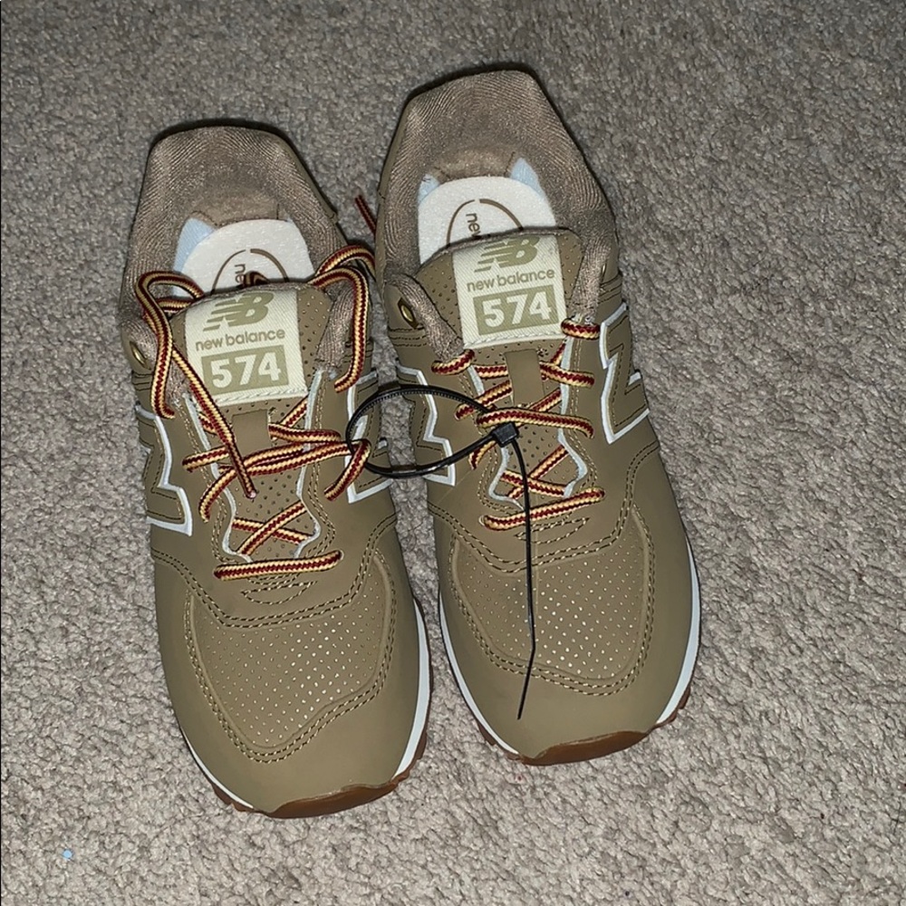 Tan New Balance shoes